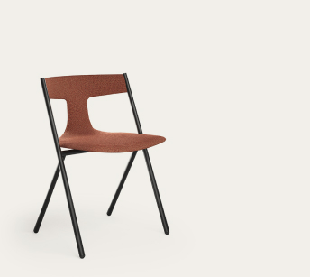 Quadra chair by Viccarbe, upholstered in terracotta fabric on seat and backrest, with a slim black steel frame.