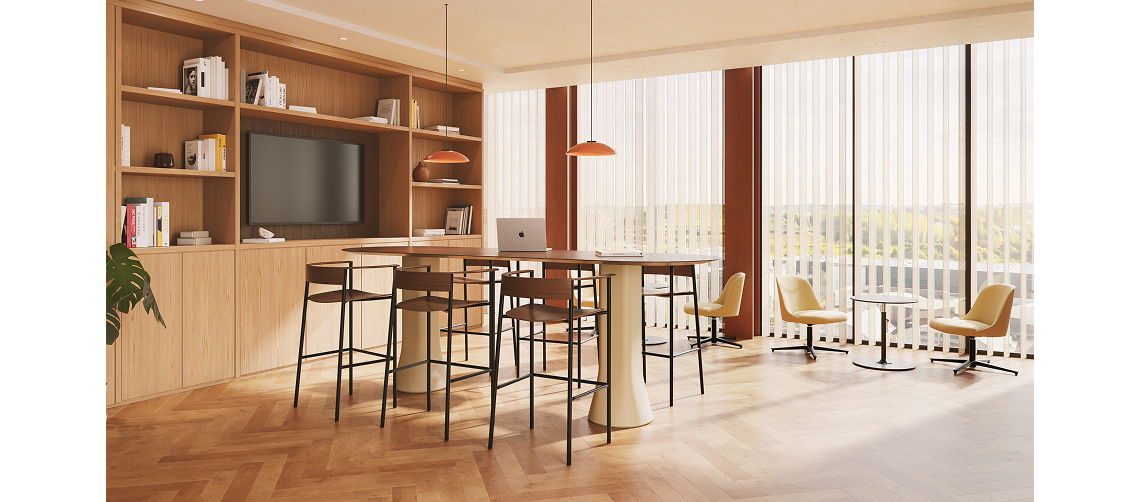 Bar-height Perxa stools in dark wood and black steel around a high table in a bright open-plan office